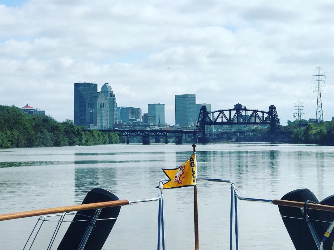 Louisville skyline with AGLCA flag