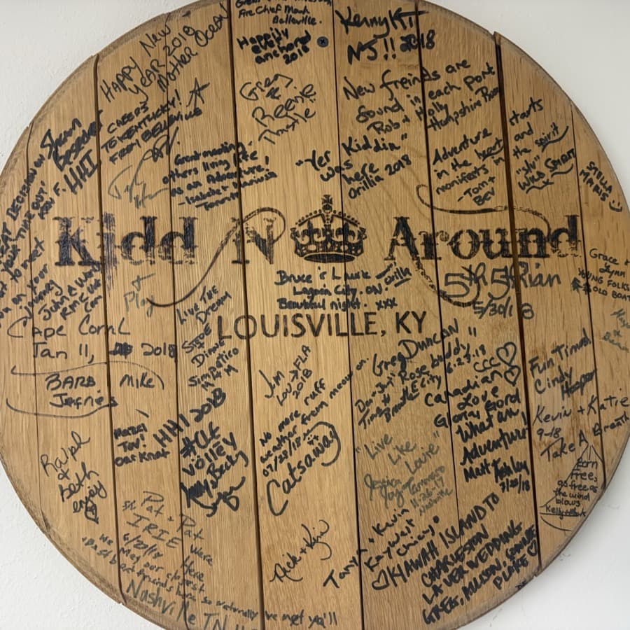 Dustin's Kidd N Around barrel head covered in signatures from his 2018 Great Loop